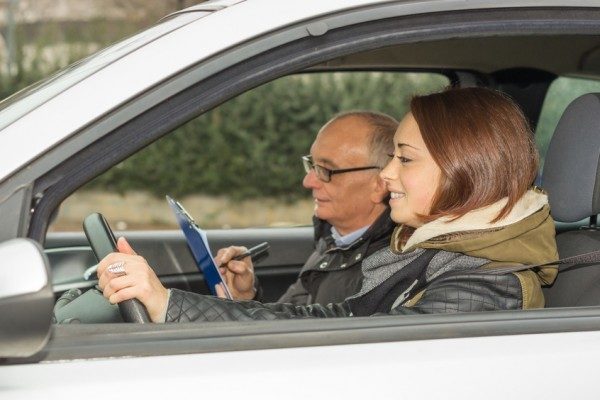 Teenager taking a driving test